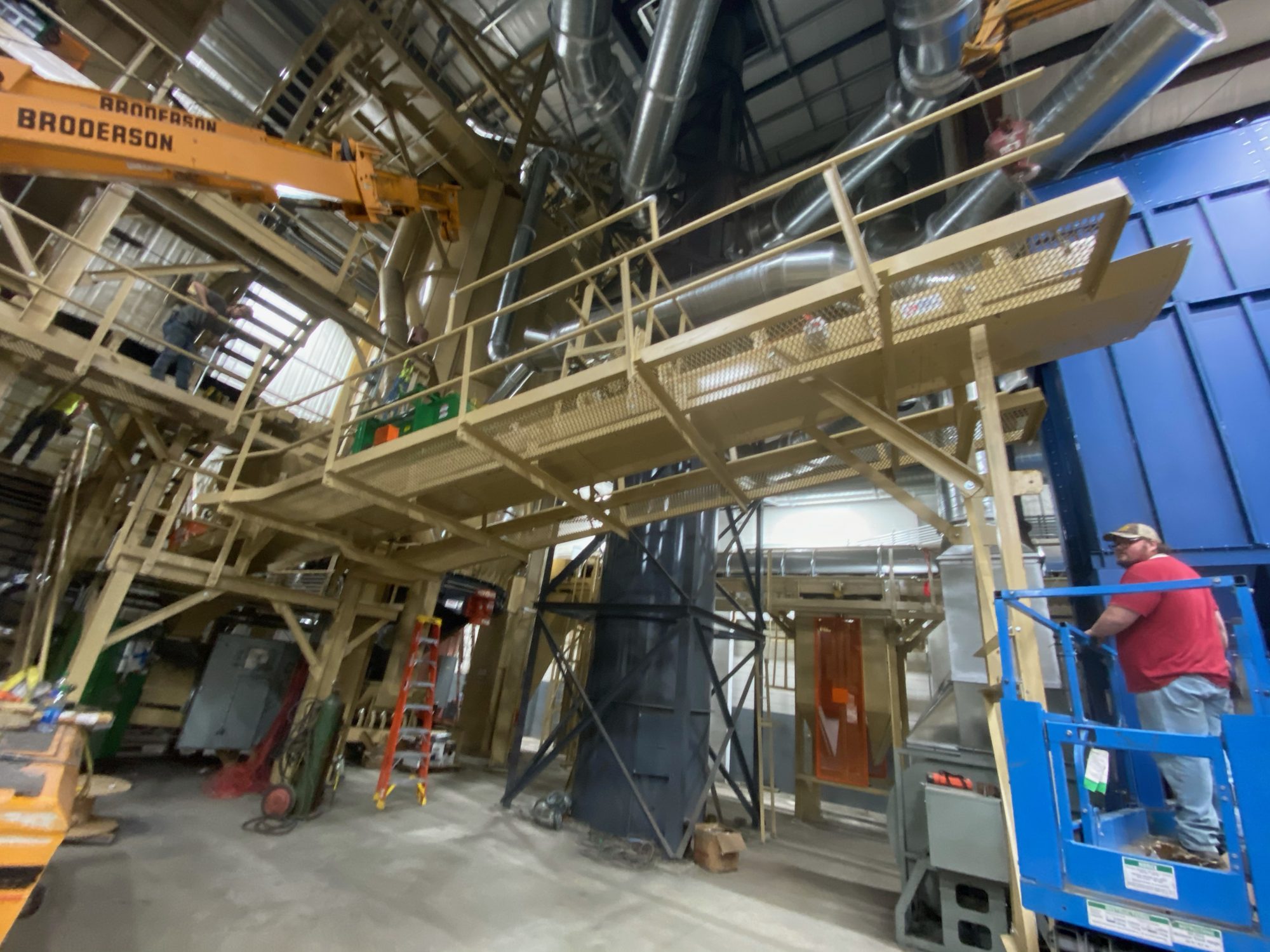 Elevated industrial access platform and duct system installed by Cork